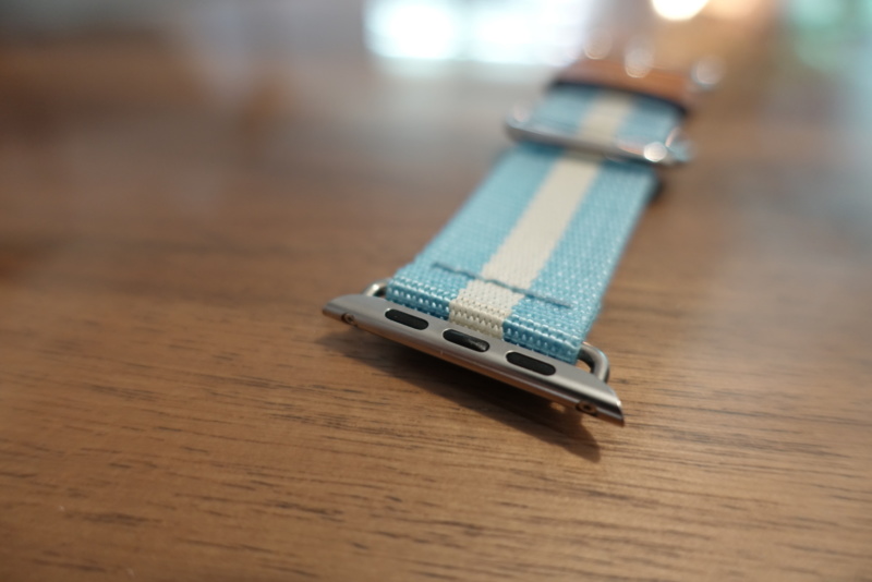 close up shot of connecting plug of TOMS for Apple watch band 42mm Light Blue Stripe