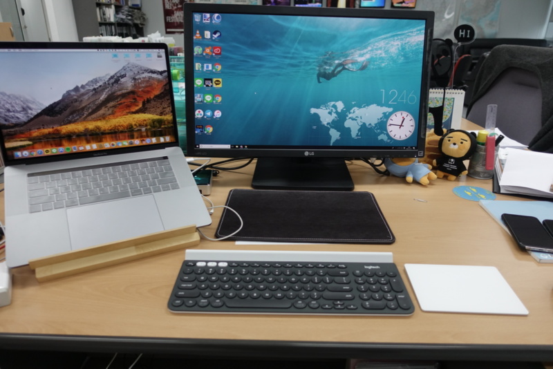 Controlling multiple computers with one keyboard no wires makes the desk cozy